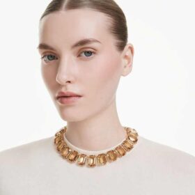 Naszyjnik Millenia z dużymi kryształami o szlifie ośmiokątnym, w kolorze karmelowym, pokryty powłoką w odcieniu złota